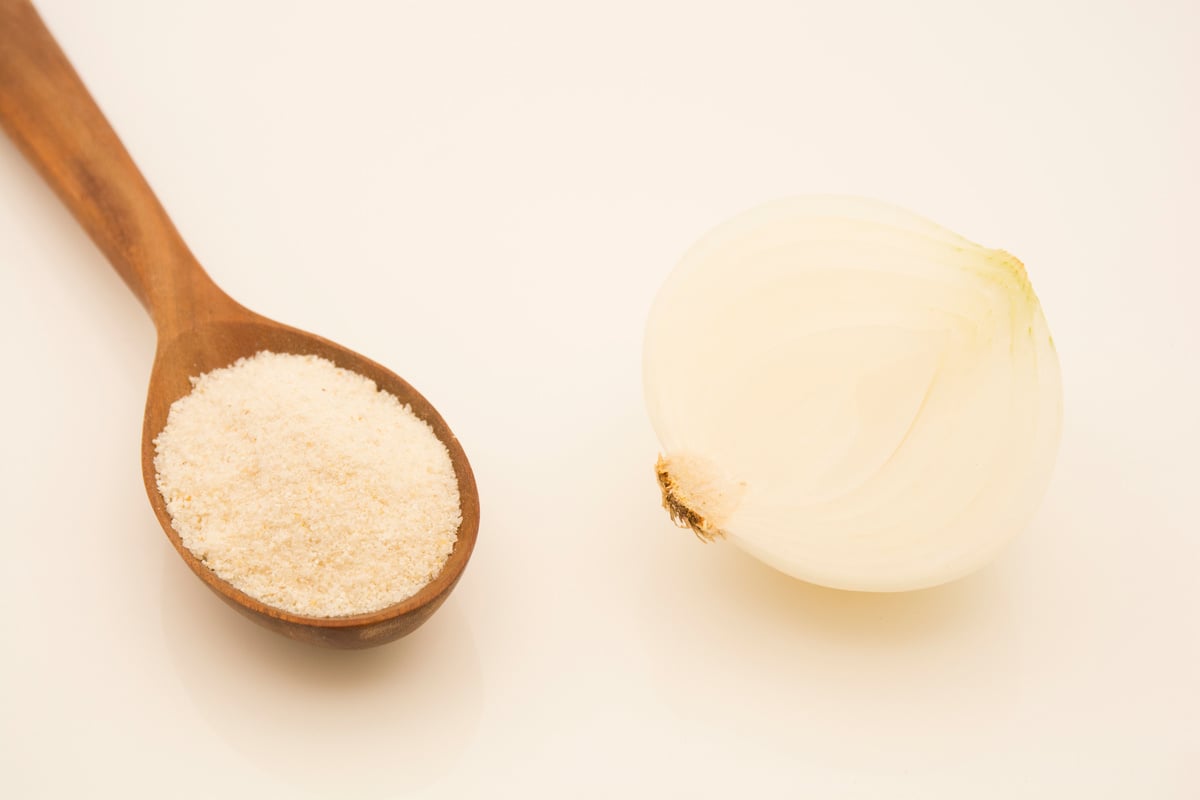 Fresh and natural ground white onion or onion powder.